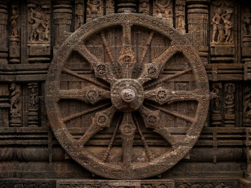 Carved stone chariot wheel at the Konark Sun Temple, Odisha