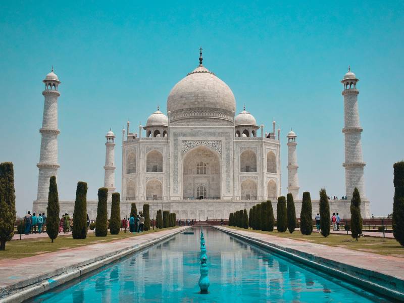 The Taj Mahal reflected in its long garden pool